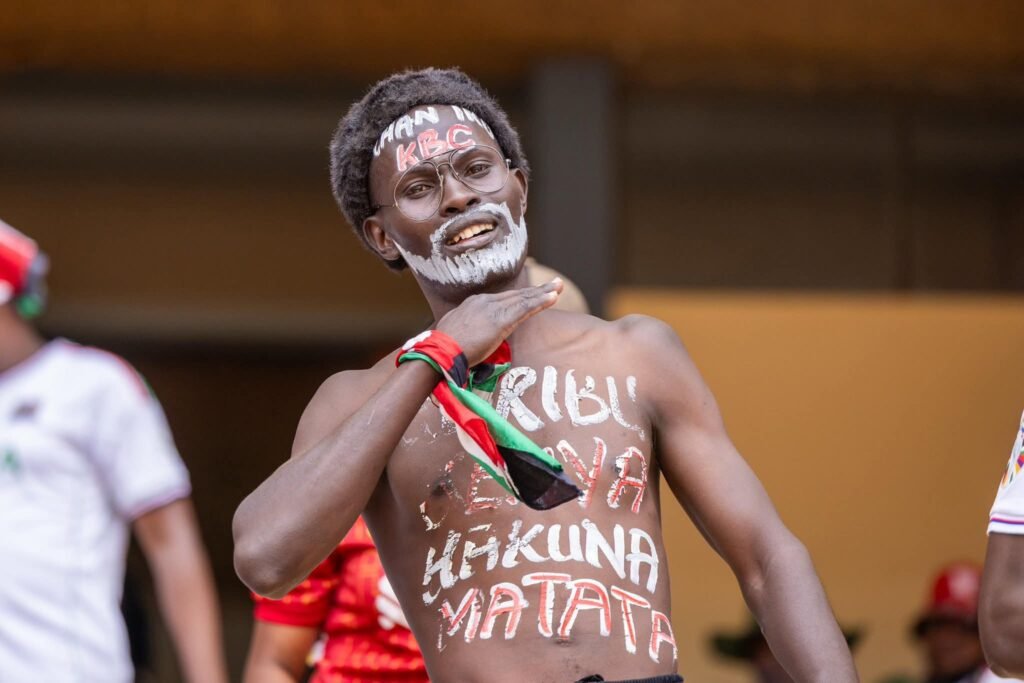 Fan enjoying a football match at Kasarani during CHAN competitions